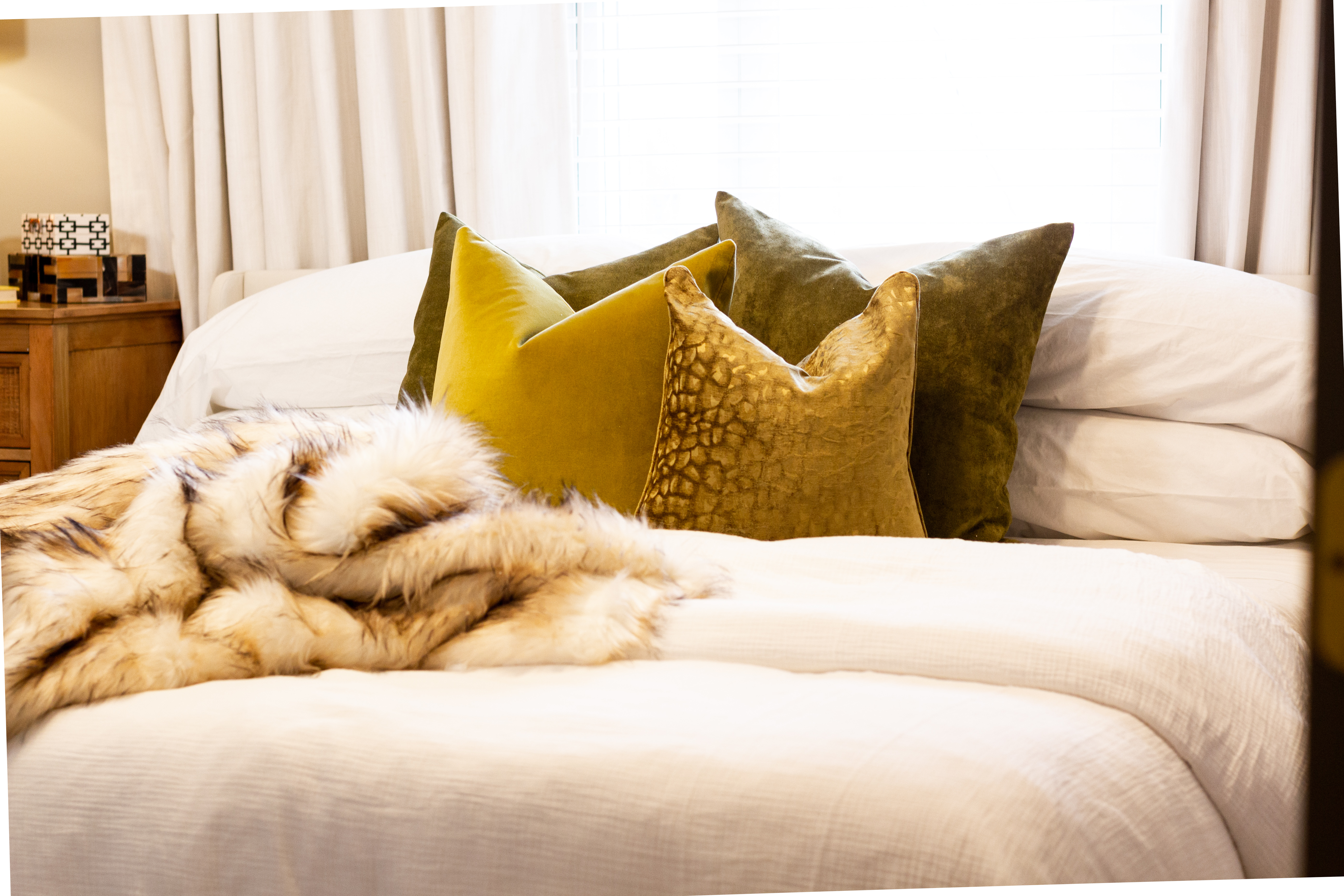 Fur Throw and Green Velvet Pillows