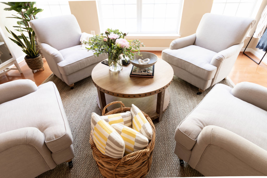 Close up of 4 chair living room decor
