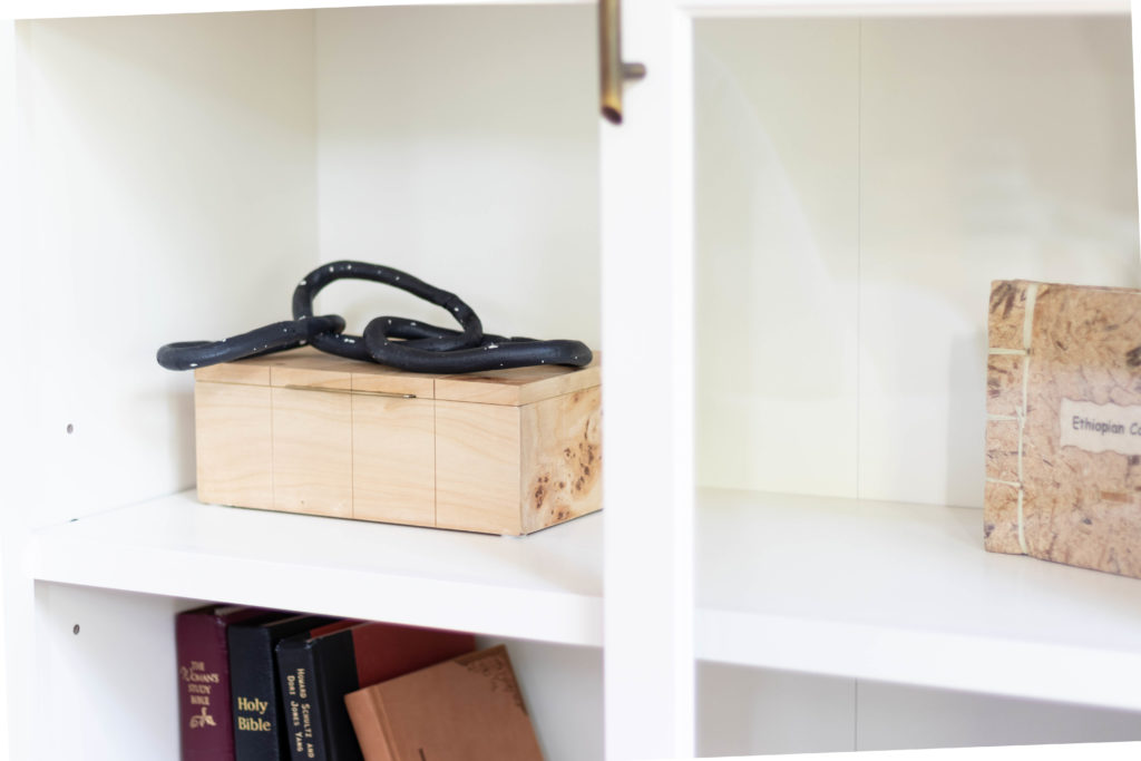 Wooden box with black decorative link